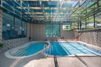 Lixian Bipeng Valley Yulan Huating Hotel - piscina