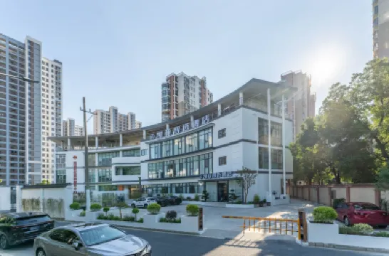 Kaiya Zhixuan Hotel (Suzhou Road Nanyuan Huqiu Wedding Dress City) Hotel berhampiran Taman Ding