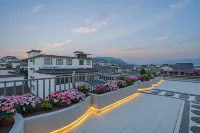 Ximan · Jade Dragon in Sight | Snow Top · Sunrise-Gilded Golden Mountain View Homestay
