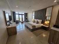 Continent Hotel Al Uqayr - 停車場