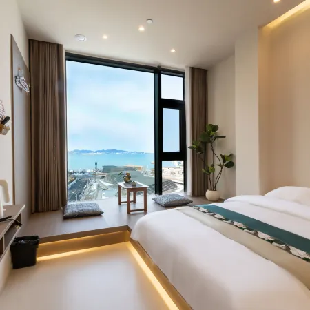Weihai Shibeiwu Scenic Apartment (Weihai Railway Station Huafa Jiulong Bay)