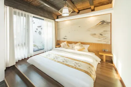 Tengyun Modern Tourism Base B&B (Jinyuan Branch) Отели рядом с достопримечательностью «Taohuayuan Scenic Area»