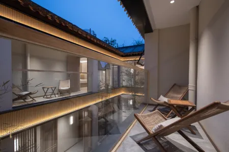 Jiyuan Huanqin Hotel (Lijingmen Cross Street Branch, Luo Yi Ancient City) Отели рядом с достопримечательностью «Shenzhou Peony Garden»