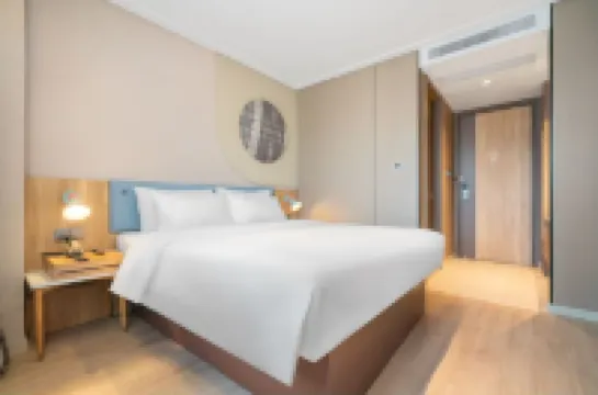 โรงแรมโฮมอินน์ (ถนนหย่งเล่อ ถนนหนานชาง วัดหนานชาน อู๋ซี) โรงแรมใกล้ถนนหนานชาง