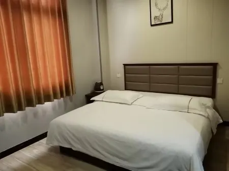 Xingyang Shengtong Express Hotel Отели рядом с достопримечательностью «Xingyang People's Park»