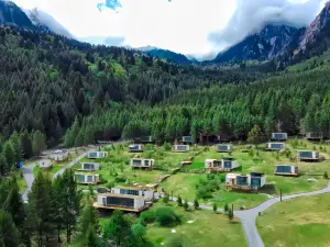 Trip.com Group Country Retreats (Womeiju Jiuzhai Forest Earth-house Joint Resort)