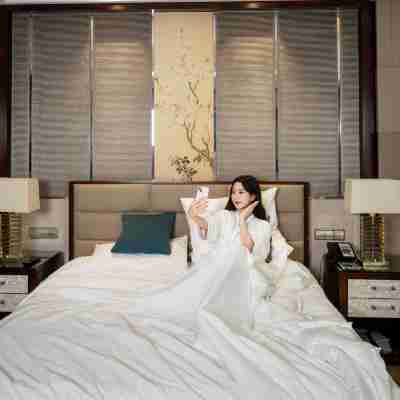 温嶺國際大酒店(曙光大廈店) Rooms