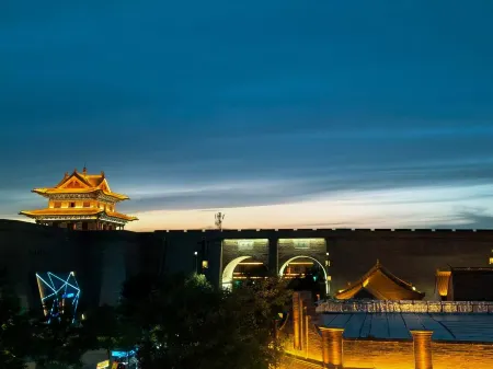 Huameishi Hot Spring Hotel (Xinzhou Ancient City Store Отели рядом с достопримечательностью «Xiurong College»