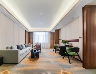Karamay Xinxing Hotel (Baicheng University Town) Отели в г. Карамай