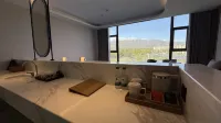 Ganzi County Wangfu Grand Hotel (Gesar Palace City) - موقف سيارات