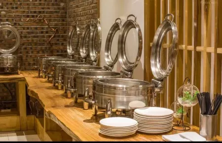 Yuanshe Yiju Hotel ( Tianfu Square Wenshu Monastery ) Отели рядом с достопримечательностью «Chengdu Polytechnic Qingyang Campus»