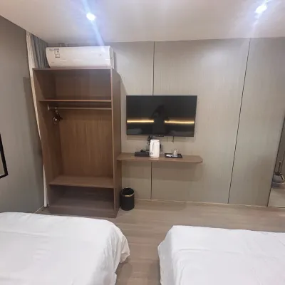 禾悅雅舍（蘇州匯金商業廣場蘇州科技大學石湖校區店） Hotel dekat Kota Xinguo