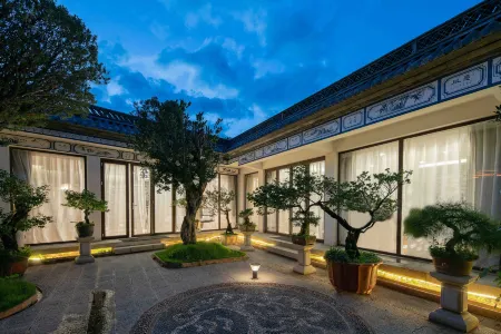Dali Mingyuetang Garden Designer Resort Hotel Отели рядом с достопримечательностью «Panxi Ferry»
