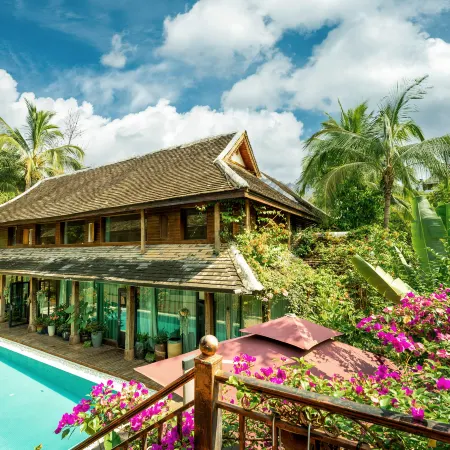 Xishuangbanna Jinghong Yunjian Qixin Rainforest Holiday VILLA