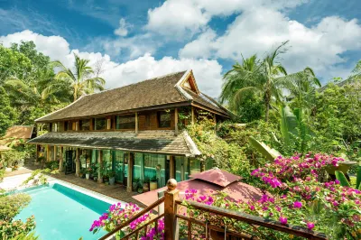 Xishuangbanna Jinghong Yunjian Qixin Rainforest Holiday VILLA Hotels near The Great Pagoda Temple of Jinghong
