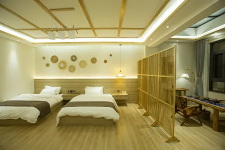 Xiaohe Yishui Inn Отели рядом с достопримечательностью «Shiping Yilonghu National Wetland Park»