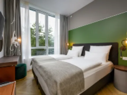 Flightgate Munich Airport Hotel, a member of Radisson Individuals ハンベルクモースのホテル