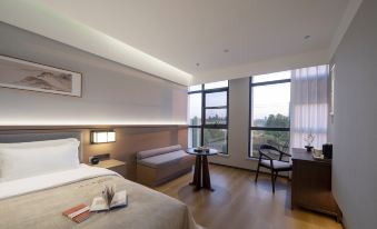 QiannaMeisuHotel(XinyangEastHigh-speedRailwayStationBranch