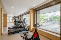 Magnotel Magnolia Hotel (Jiamusi Railway Station New Mart) - Gym