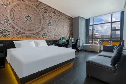 Moxi E-sports Hotel (Jiangmen Wanda Plaza Huiyue Rongcheng Store)