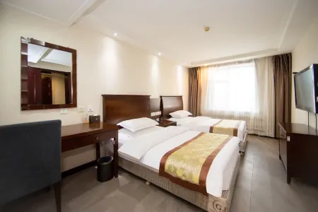 Andi Zhongchang Serviced Apartment (Changchun Railway Station Wanda Plaza) Отели рядом с достопримечательностью «Changchun Normal University»