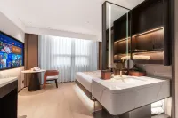 Xingang Holiday Hotel(Xinzheng International Airport Shop) Hotel in zona Aeroporto di Zhengzhou-Xinzheng