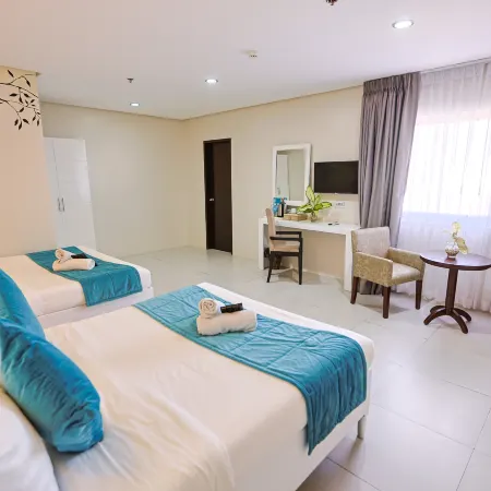 Holiday Suites Business District (Empire Suites Hotel)
