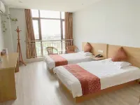 Changshu Junyue Business Inn Отели рядом с достопримечательностью «Соседственный центр Xinzhen, Чжэцзян»