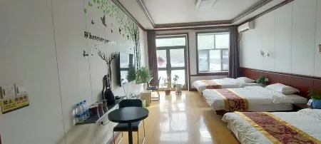 Wangjia Inn Отели в г. Шавань