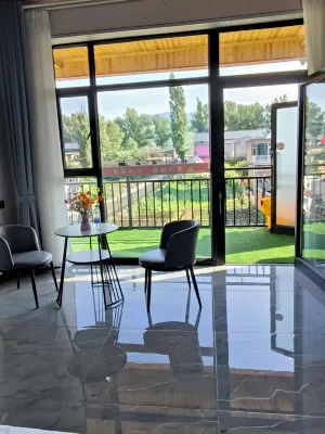 Nalati Xianqingju Farmhouse - servizio colazione