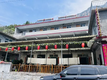 Huguan Jiujiayi Farm Inn Отели рядом с достопримечательностью «Jiulongdong Sceneic Area»