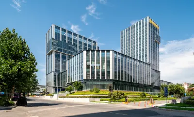 Qingdao Ronghai Yaozhou Hotel Отели рядом с достопримечательностью «Парк Цзиньхуабридж»
