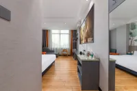 Xiangqing Qi'an Smart Hotel (Tunchang Central Commercial Plaza)