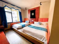Mingcai Hotel (Siguniangshan Scenic Area)