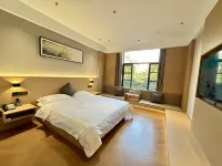 Feile Hotel (Luoyang Longmen High speed Railway Station Branch) Hotels near Luo Long