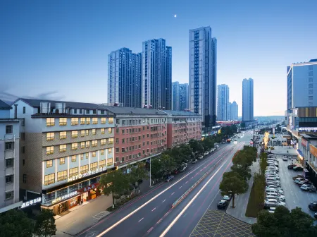 Miyang Apartment Hotel (Yueyang County) Отели рядом с достопримечательностью «Hunan Petrochemical Vocational and Technical College (New Campus)»