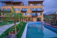 구유 시즌스 · 시크릿 오아시스 디자이너 풀 & 가든 리트리트 (왕시안 밸리 지점)