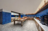 Manxin Hotel (Starlight Night Market Branch, Gaozhuang Xishuangjing, Jinghong, Xishuangbanna) - bar