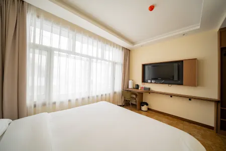 Beiguochun Hot Spring Resort (Yabuli Ski Resort Branch) Отели рядом с достопримечательностью «Yabuli Sightseeing Cable Car and World's No. 1 Slide»