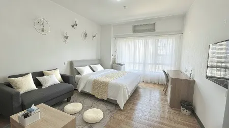 Mi La Boutique Apartment Отели рядом с достопримечательностью «Fuyuan Youye»