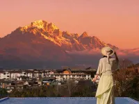 Beyond the Clouds · Golden Sunrise | Snow Mountain & Lake View Secret Garden Hote Hotels in Lijiang