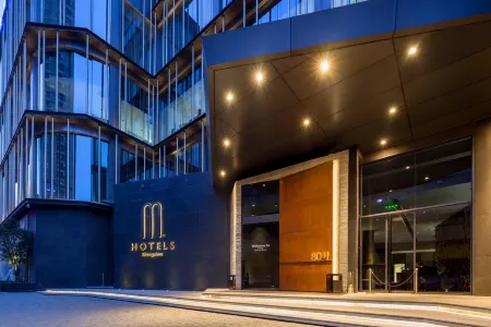 M Hotel Отели рядом с достопримечательностью «University for Science & Technology Zhengzhou»