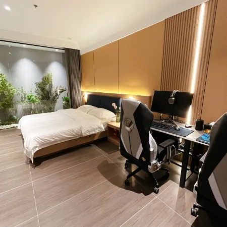 Meigao E-Sports Hotel Отели в г. Данту