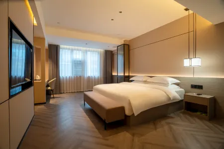 Golden Harvest Kylin Hotel Отели в г. Цзяхэ