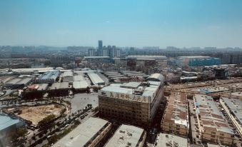 Wayu Washe Hotel (Kunming Century City Xiaodongcun Subway Station) - Housity