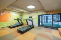 Orange Hotel (Leshan High-speed Railway Station Shihao Plaza) - ที่มีฟิตเนส