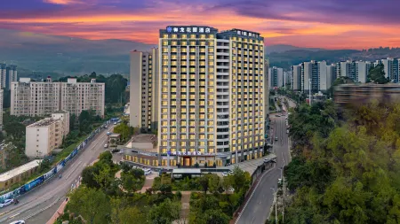 YULONG GARDEN HOTEL Отели рядом с достопримечательностью «Yunnan Vocational College of Mechanical and Electrical Technology»