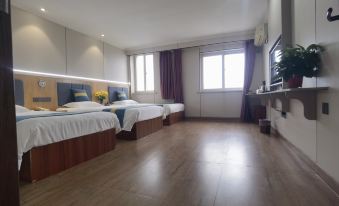 Ucd hotel (gao qing xin long inn)