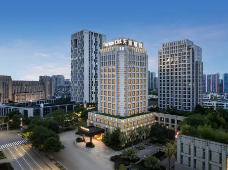 Teckon Xiyue Hotel (Ningbo Yinzhou Wanda Plaza Incity Store) Отели рядом с достопримечательностью «University Park Library»