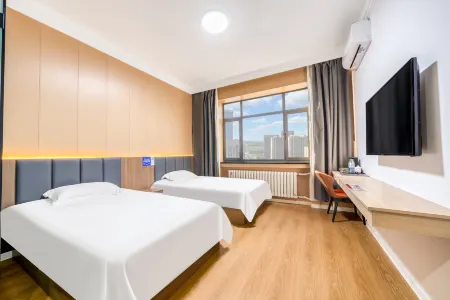 First Village Hotel (Harbin Ice and Snow World Branch) Отели рядом с достопримечательностью «Harbin Far East Institute of Technology»